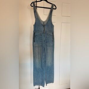 Free People denim coveralls.